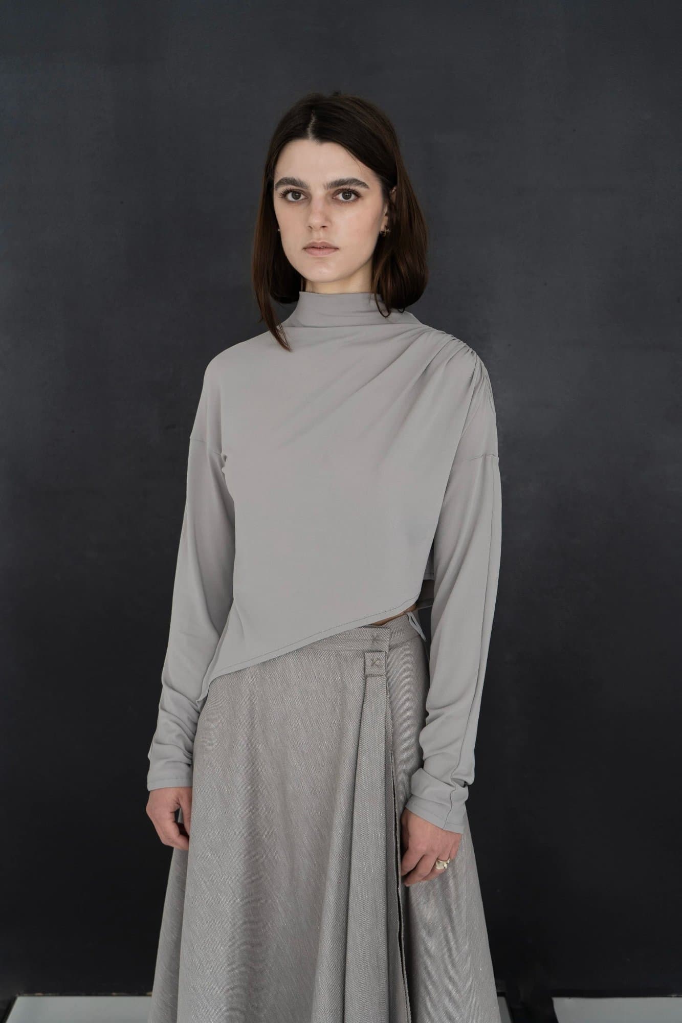 TSEMENT ASYMMETRIC HIGH NECK TOP — K M by L A N G E